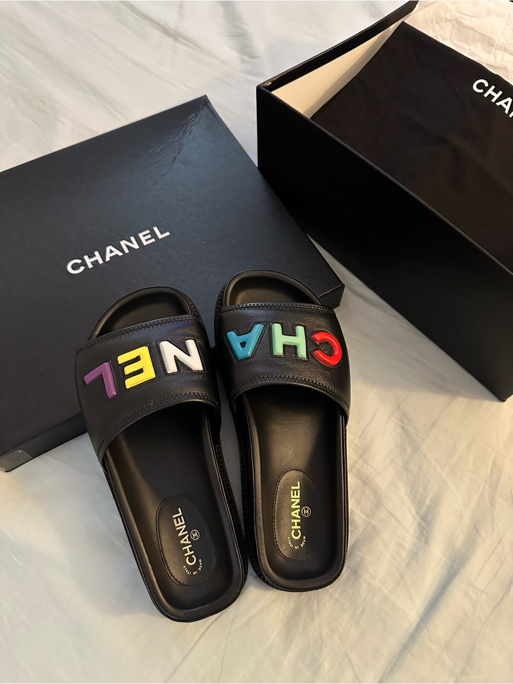 CHANEL Black Leather Slides with Multicolor Logo